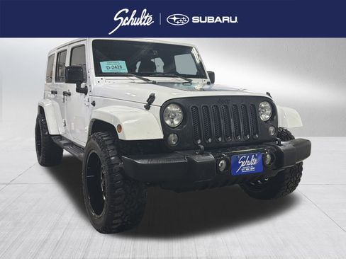 Used 2014 Jeep Wrangler Unlimited Sahara w/ Dual Top Group image 1