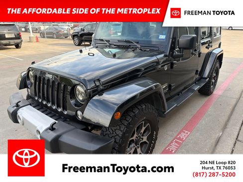 Used 2015 Jeep Wrangler Unlimited Sahara w/ Dual Top Group AWD/4WD image 1