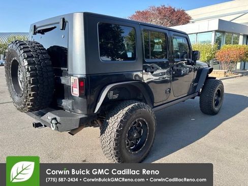 Used 2010 Jeep Wrangler Unlimited Rubicon w/ Dual Top Group AWD/4WD image 6