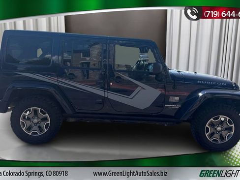 Used 2013 Jeep Wrangler Unlimited Rubicon w/ Dual Top Group AWD/4WD image 6