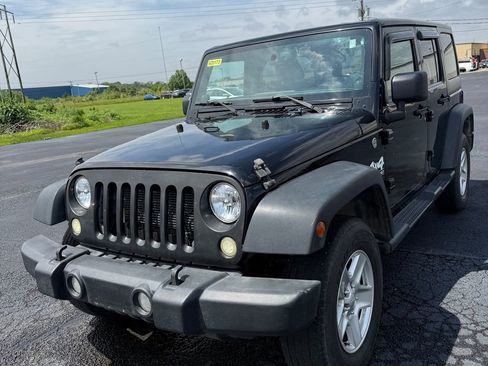 Used 2013 Jeep Wrangler Unlimited Sport w/ Dual Top Group AWD/4WD image 22