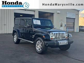 Used 2013 Jeep Wrangler Unlimited Sahara w/ Dual Top Group AWD/4WD video 1