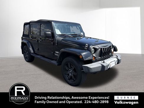 Used 2011 Jeep Wrangler Unlimited Sahara w/ Dual Top Group AWD/4WD image 2