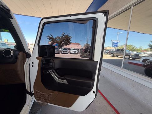 Used 2013 Jeep Wrangler Unlimited Sahara w/ Dual Top Group AWD/4WD image 15