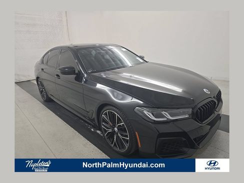 Used 2023 BMW M550i xDrive AWD/4WD image 1