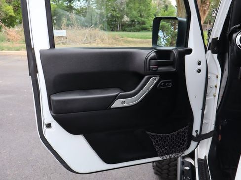 Used 2013 Jeep Wrangler Unlimited Sahara AWD/4WD image 23