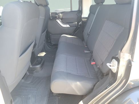 Used 2012 Jeep Wrangler Unlimited Sahara w/ Dual Top Group AWD/4WD image 11