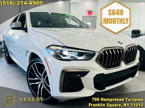 Used 2023 BMW X6 M50i w/ Parking Assistance Package image 1