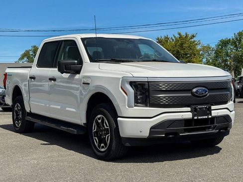 Used 2023 Ford F150 Lightning XLT AWD/4WD image 1