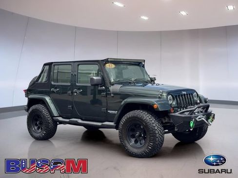 Used 2012 Jeep Wrangler Unlimited Sahara w/ Trailer Tow Group AWD/4WD image 1