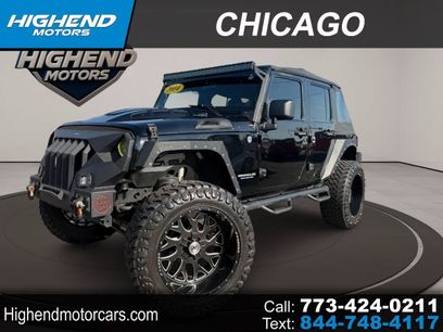 Used 2014 Jeep Wrangler Unlimited Rubicon w/ Dual Top Group