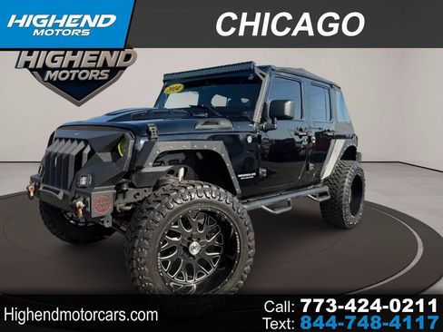 Used 2014 Jeep Wrangler Unlimited Rubicon w/ Dual Top Group AWD/4WD image 1