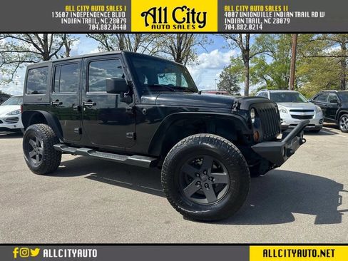 Used 2013 Jeep Wrangler Unlimited Sport AWD/4WD image 1