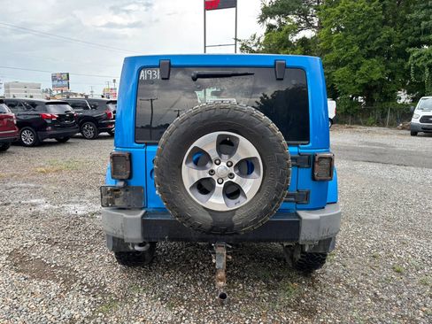 Used 2014 Jeep Wrangler Unlimited Sahara AWD/4WD image 3