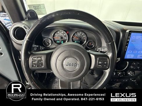 Used 2014 Jeep Wrangler Unlimited Sahara w/ Dual Top Group AWD/4WD image 12