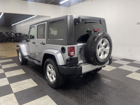 Used 2013 Jeep Wrangler Unlimited Sahara w/ Dual Top Group image 2