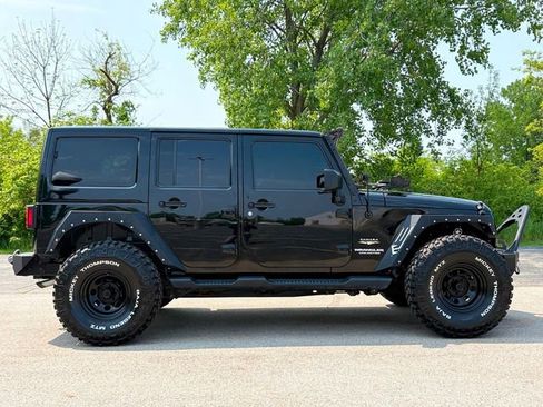 Used 2013 Jeep Wrangler Unlimited Sahara w/ Dual Top Group image 8