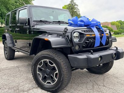 Used 2014 Jeep Wrangler Unlimited Sahara w/ Dual Top Group