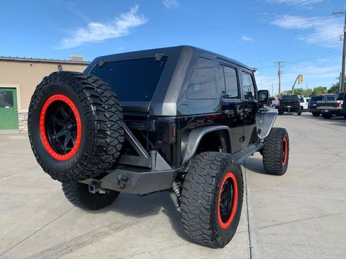 Used 2010 Jeep Wrangler Unlimited Rubicon w/ Dual Top Group image 8