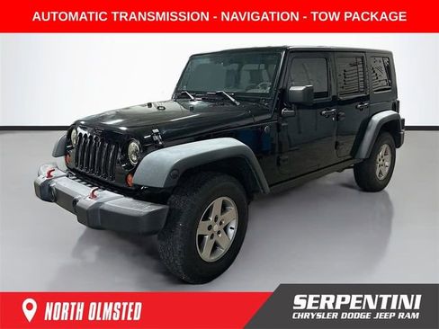 Used 2010 Jeep Wrangler Unlimited Rubicon w/ Dual Top Group image 1
