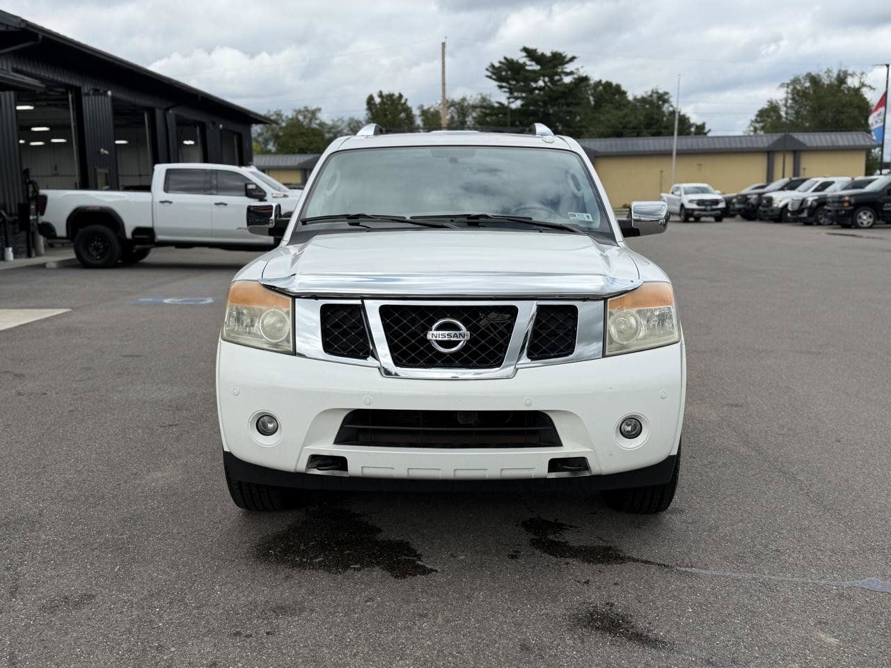 Used 2011 Nissan Armada Platinum w/ 2nd Row Captain Seat Pkg AWD/4WD image 2
