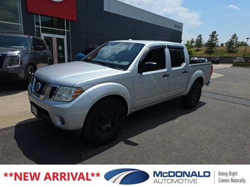 Used 2012 Nissan Frontier SV w/ SV Premium Utility Pkg AWD/4WD image 1