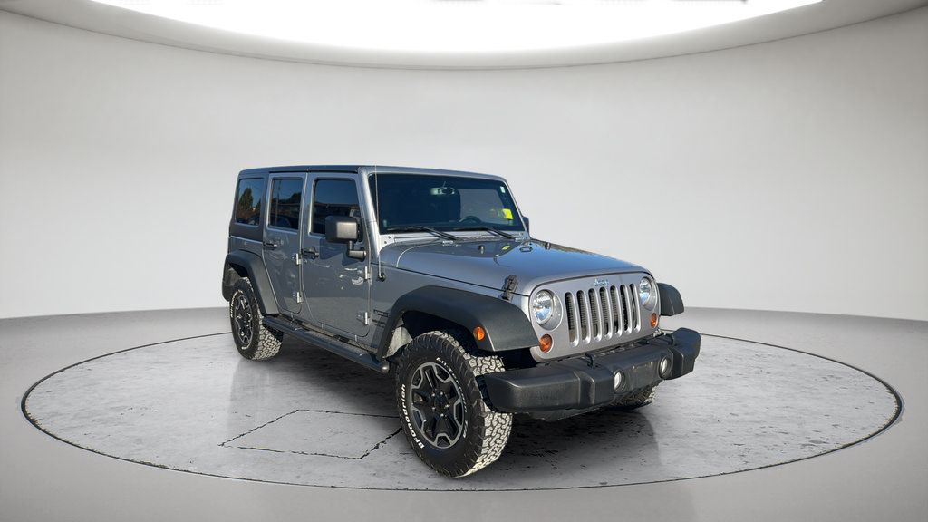 Used 2013 Jeep Wrangler Unlimited Sport AWD/4WD image 1