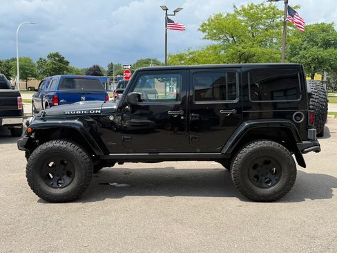 Used 2015 Jeep Wrangler Unlimited Rubicon w/ Dual Top Group AWD/4WD image 2