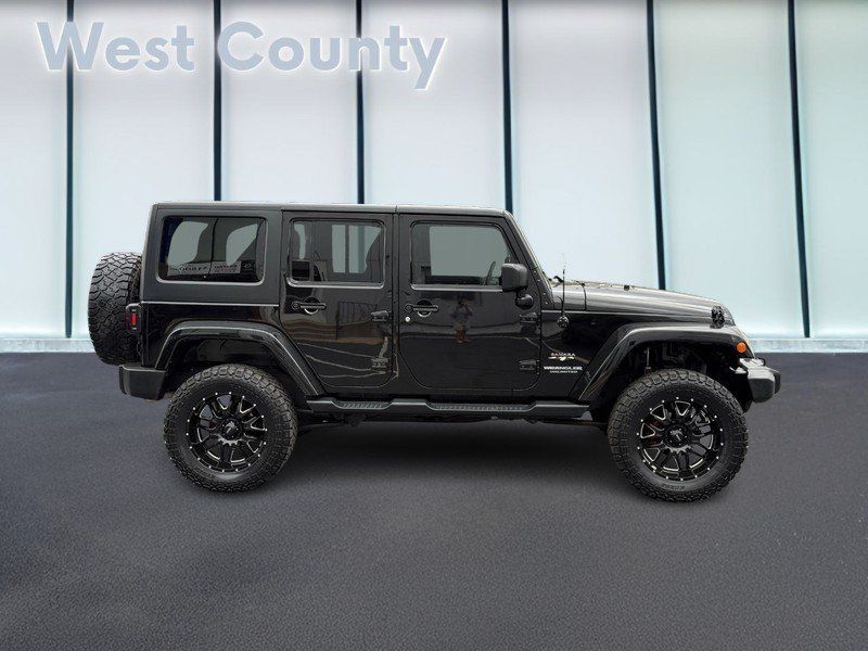 Used 2016 Jeep Wrangler Unlimited Sahara w/ Dual Top Group AWD/4WD image 2