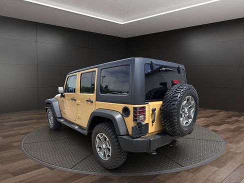 Used 2014 Jeep Wrangler Unlimited Rubicon w/ Dual Top Group AWD/4WD image 6