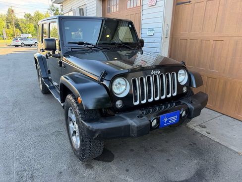 Used 2017 Jeep Wrangler Unlimited Sahara AWD/4WD image 1