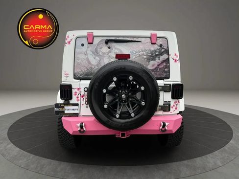 Used 2013 Jeep Wrangler Unlimited Sahara w/ Connectivity Group AWD/4WD image 4