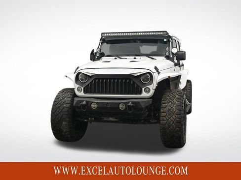 Used 2014 Jeep Wrangler Unlimited Sahara w/ Dual Top Group image 9