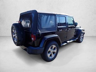 Used 2016 Jeep Wrangler Unlimited Sahara AWD/4WD video 3