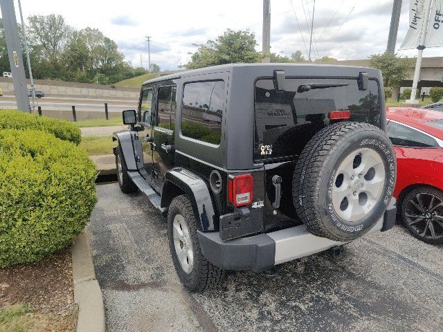 Used 2014 Jeep Wrangler Unlimited Sahara w/ Dual Top Group AWD/4WD image 7