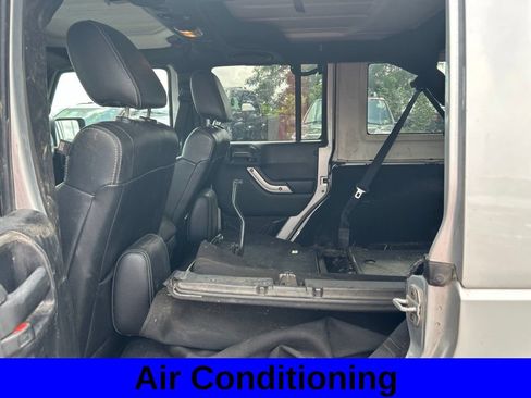 Used 2012 Jeep Wrangler Unlimited Sahara w/ Dual Top Group AWD/4WD image 7
