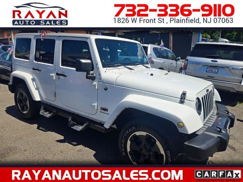 Used 2014 Jeep Wrangler Unlimited Sahara AWD/4WD image 1