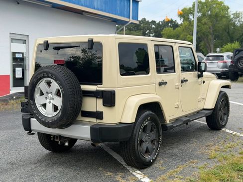 Used 2012 Jeep Wrangler Unlimited Sahara w/ Dual Top Group AWD/4WD image 5