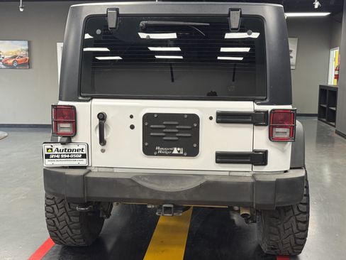 Used 2015 Jeep Wrangler Sport w/ Mopar Black Appearance Group image 5