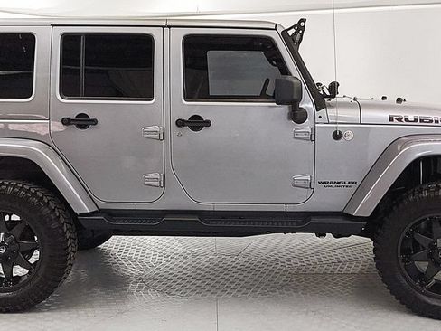 Used 2014 Jeep Wrangler Unlimited Rubicon w/ Dual Top Group AWD/4WD image 2