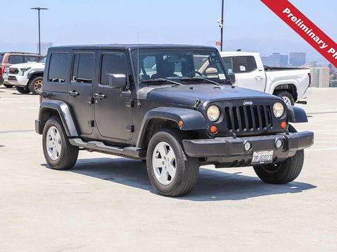 Used 2010 Jeep Wrangler Unlimited Sahara w/ Dual Top Group AWD/4WD image 3