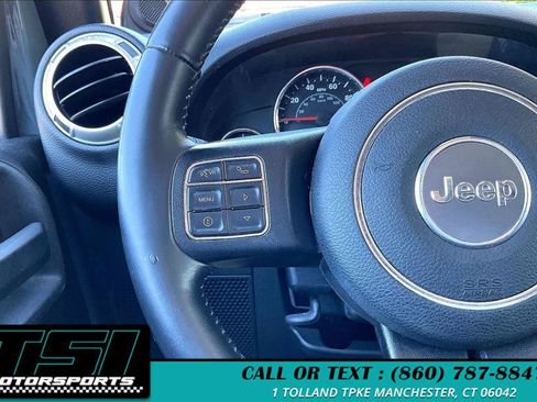 Used 2014 Jeep Wrangler Unlimited Sahara w/ Dual Top Group AWD/4WD image 16