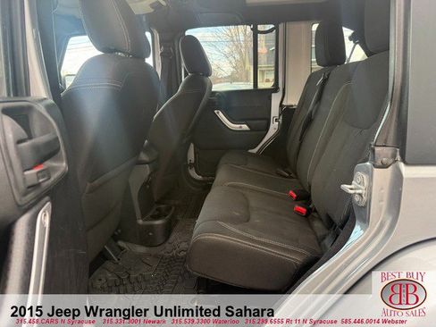 Used 2015 Jeep Wrangler Unlimited Sahara w/ Dual Top Group AWD/4WD image 11