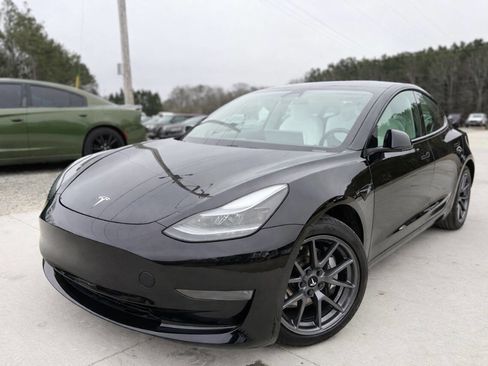 Used 2021 Tesla Model 3 Standard Range Plus image 1