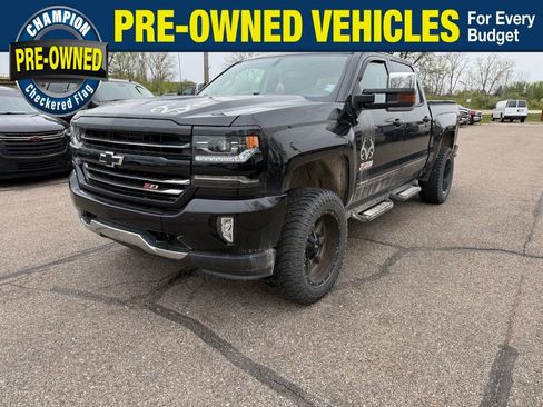 Used 2017 Chevrolet Silverado 1500 LTZ Z71 w/ Realtree Edition AWD/4WD image 1