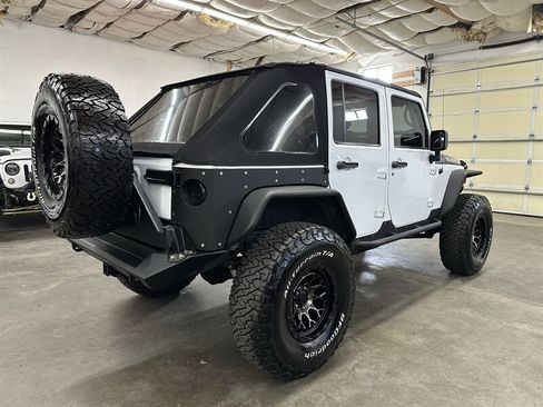 Used 2014 Jeep Wrangler Unlimited Rubicon w/ Max Tow Package AWD/4WD image 3