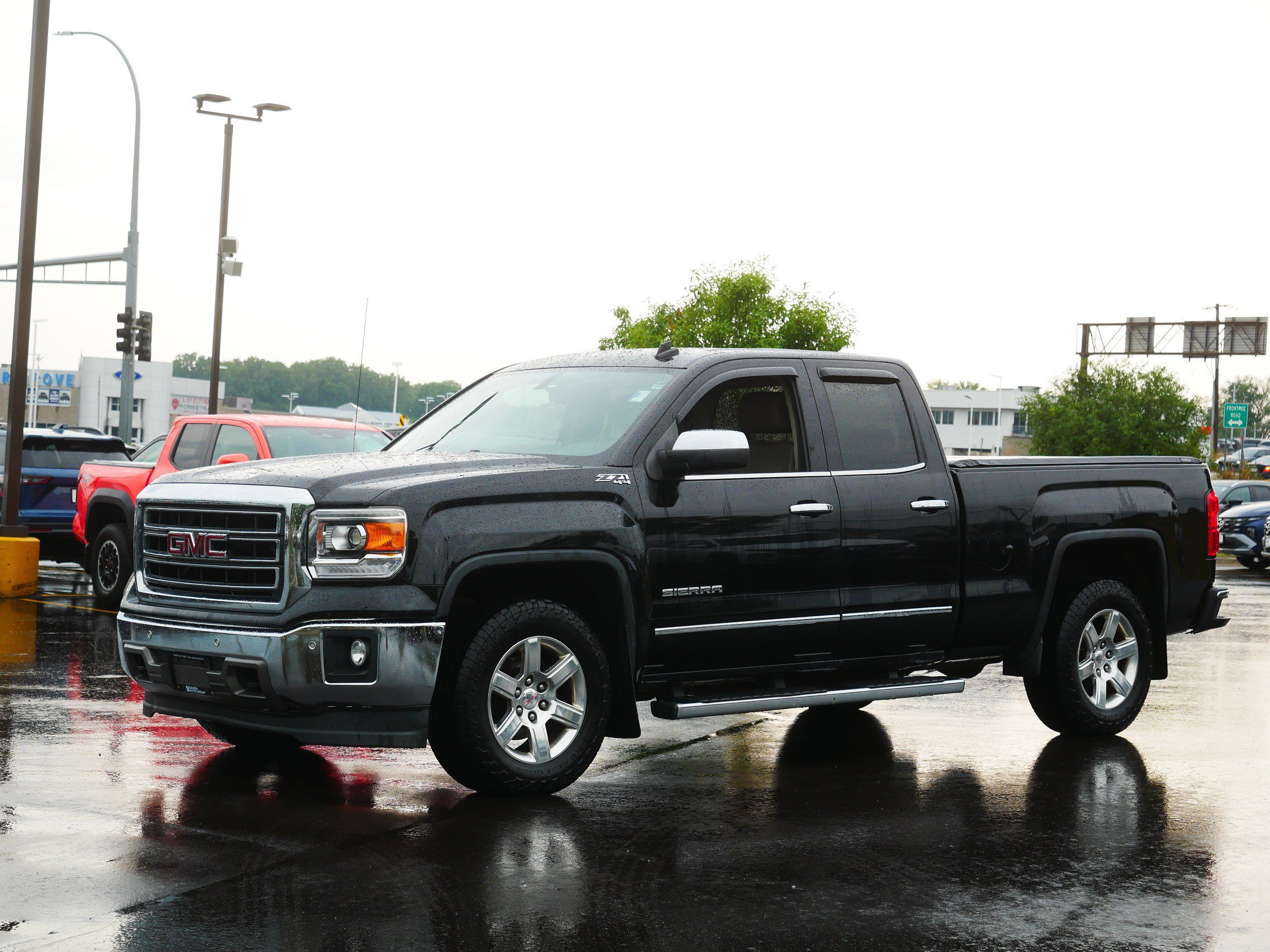 Used 2014 GMC Sierra 1500 SLT w/ SLT Preferred Package AWD/4WD image 2