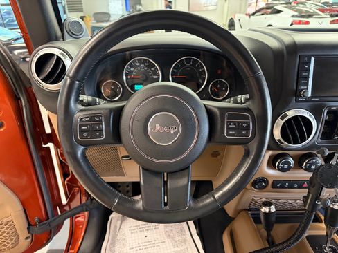 Used 2014 Jeep Wrangler Unlimited Sahara w/ Dual Top Group AWD/4WD image 10