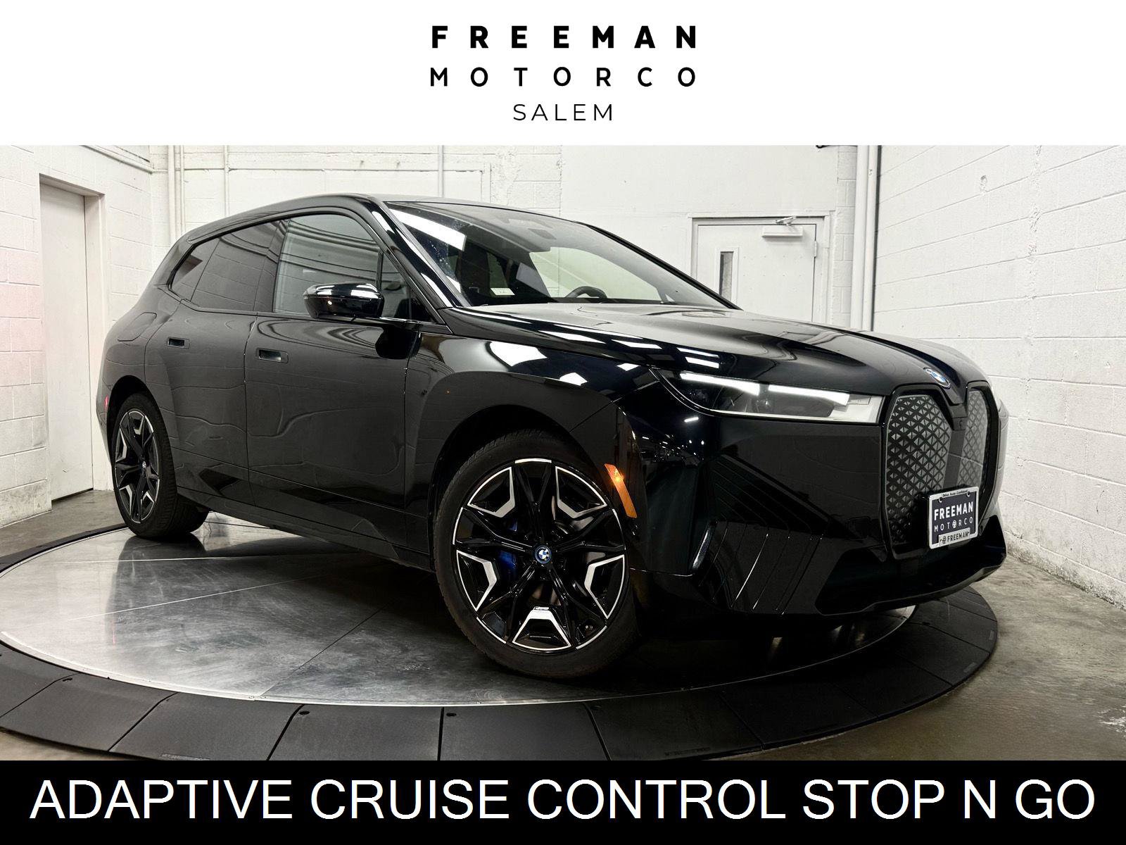 Used 2024 BMW iX xDrive50 w/ Sport Package AWD/4WD image 1