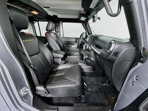 Used 2013 Jeep Wrangler Unlimited Sahara w/ Dual Top Group AWD/4WD image 33